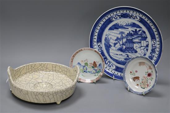A Chinese crackleglaze censer, two famille rose saucers and a blue and white dish largest diameter 24cm